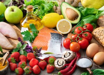 Composition with assorted organic food products on wooden table Composition with assorted organic food products on wooden table. Healthy food concept